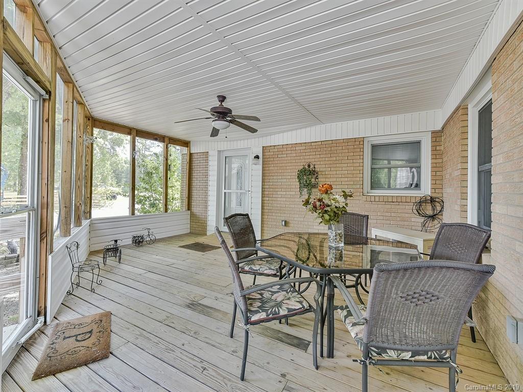 507 Sikes Mill Road Monroe, NC 28110 - Photo 31 of 40 a view of a dining room with furniture window and outside view