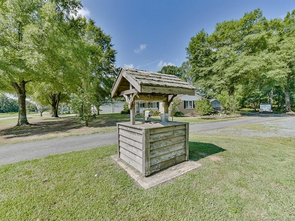 507 Sikes Mill Road Monroe, NC 28110 - Photo 34 of 40 a front view of a house with a yard