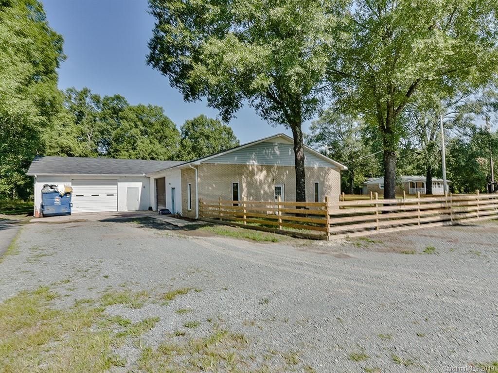 507 Sikes Mill Road Monroe, NC 28110 - Photo 35 of 40 a view of a house with a yard and sitting area