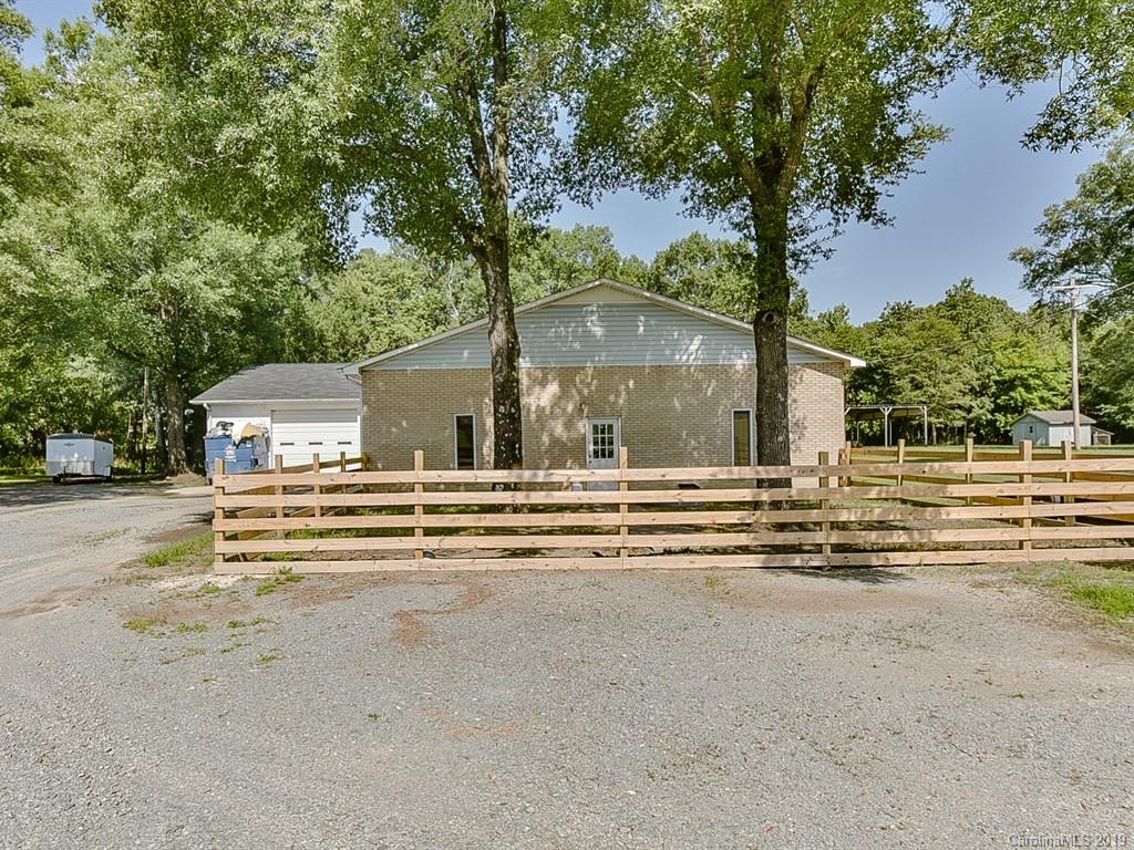 507 Sikes Mill Road Monroe, NC 28110 - Photo 36 of 40 a view of a house with a street