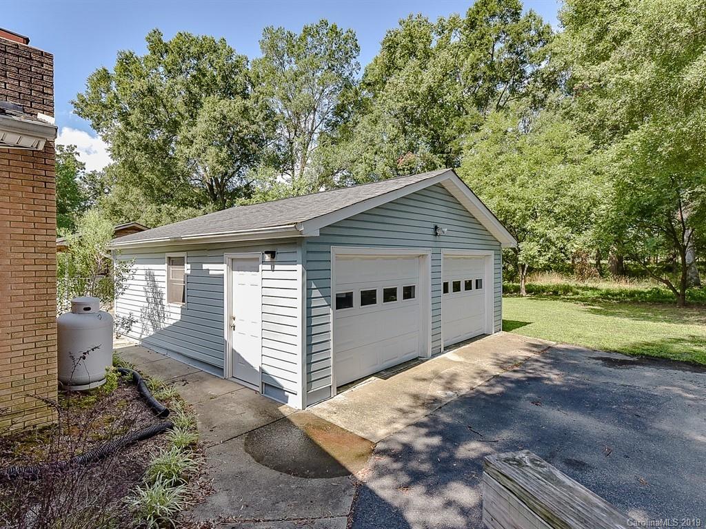 507 Sikes Mill Road Monroe, NC 28110 - Photo 39 of 40 a view of a house with a yard