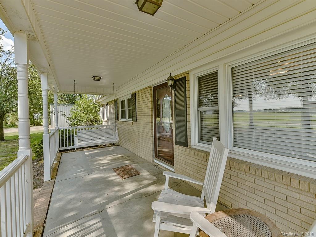 507 Sikes Mill Road Monroe, NC 28110 - Photo 7 of 40 a view of porch with seating space