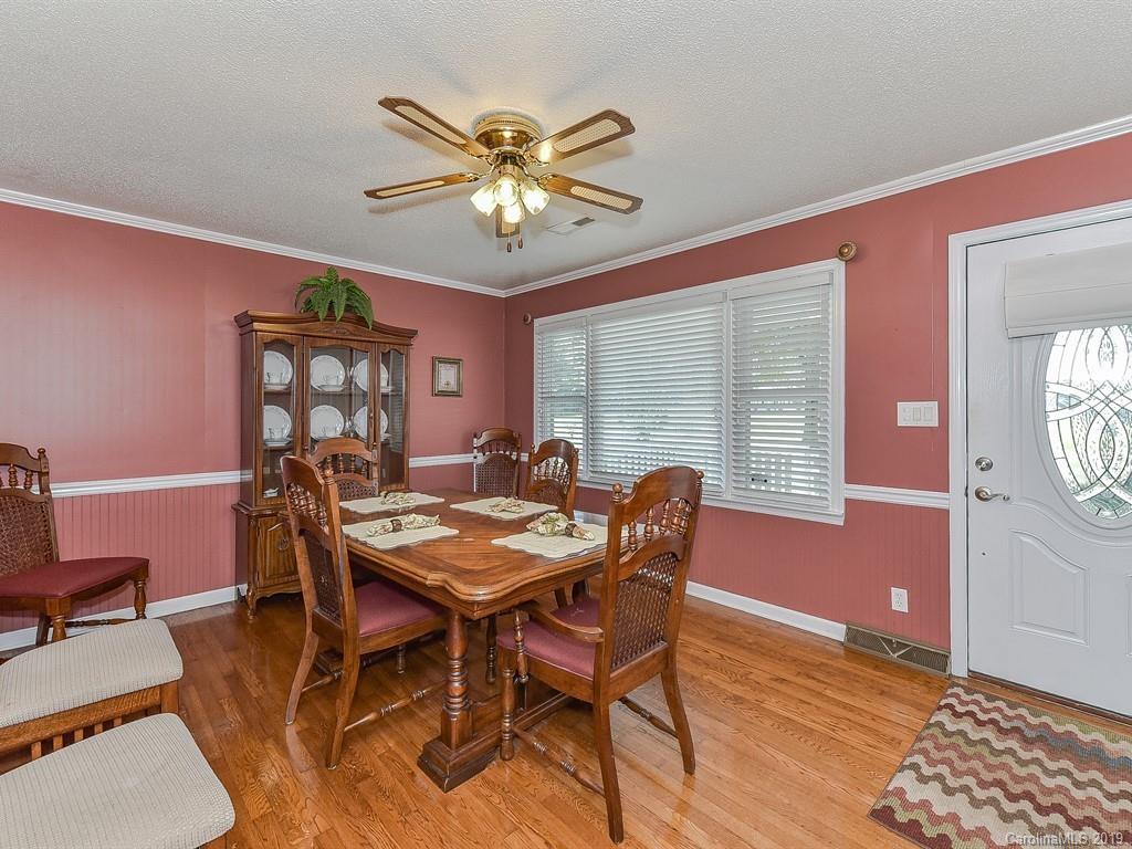 507 Sikes Mill Road Monroe, NC 28110 - Photo 9 of 40 a view of a dining room with furniture