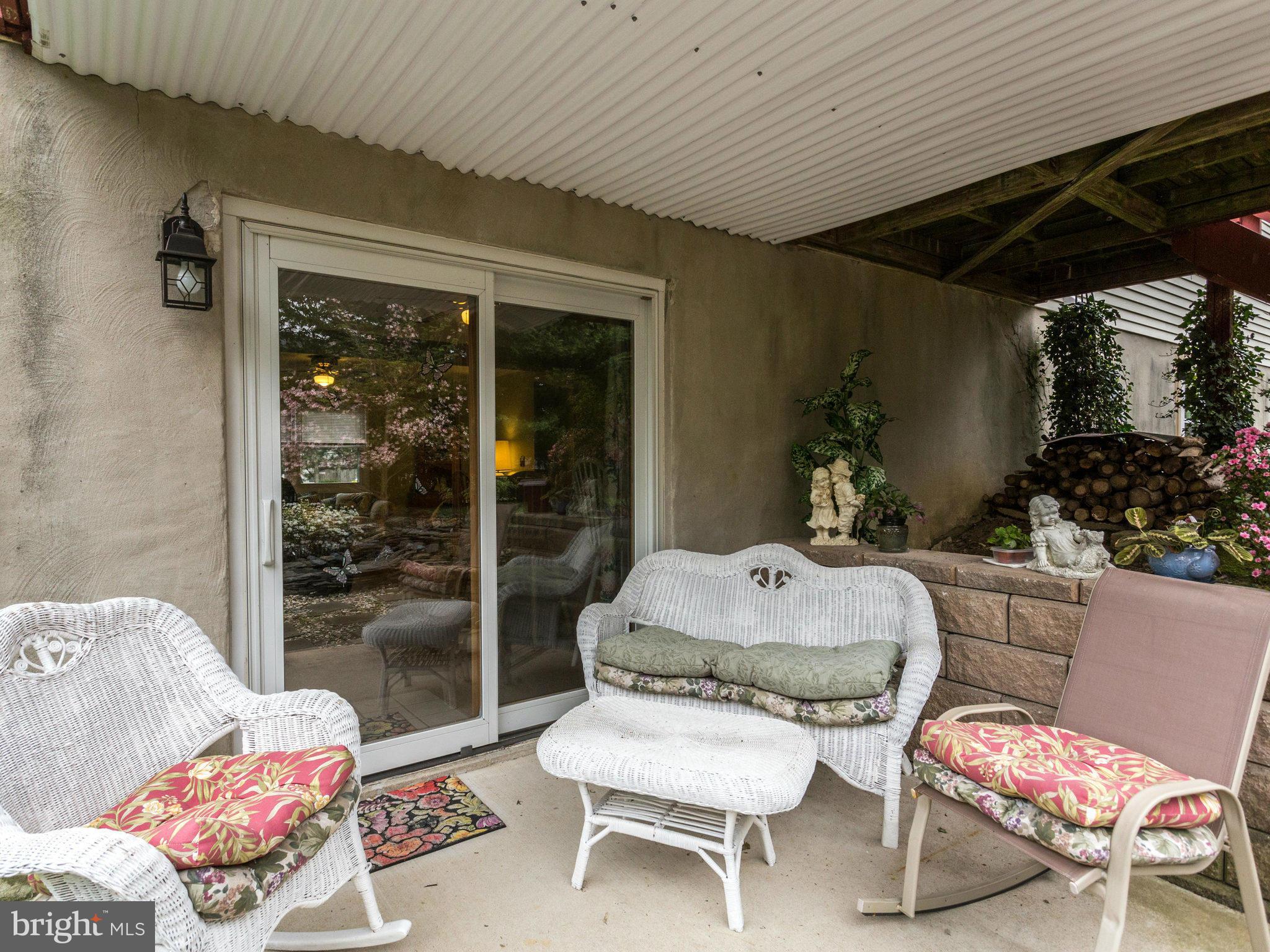 824 Uniontown Road Westminster, MD 21158 - Photo 26 of 30 Covered Sitting Area in Back Yard