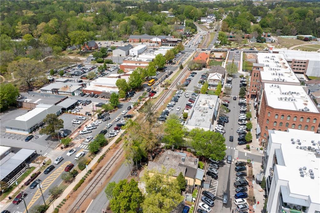 360 Chambers Street, Unit 402 Woodstock, GA 30188 - Photo 31 of 37 an aerial view of residential houses with outdoor space