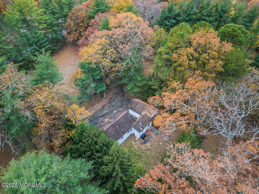 270 Alexander Avenue Howell, NJ 07731 - Photo 13 of 35 an aerial view of a house with a yard and lake view
