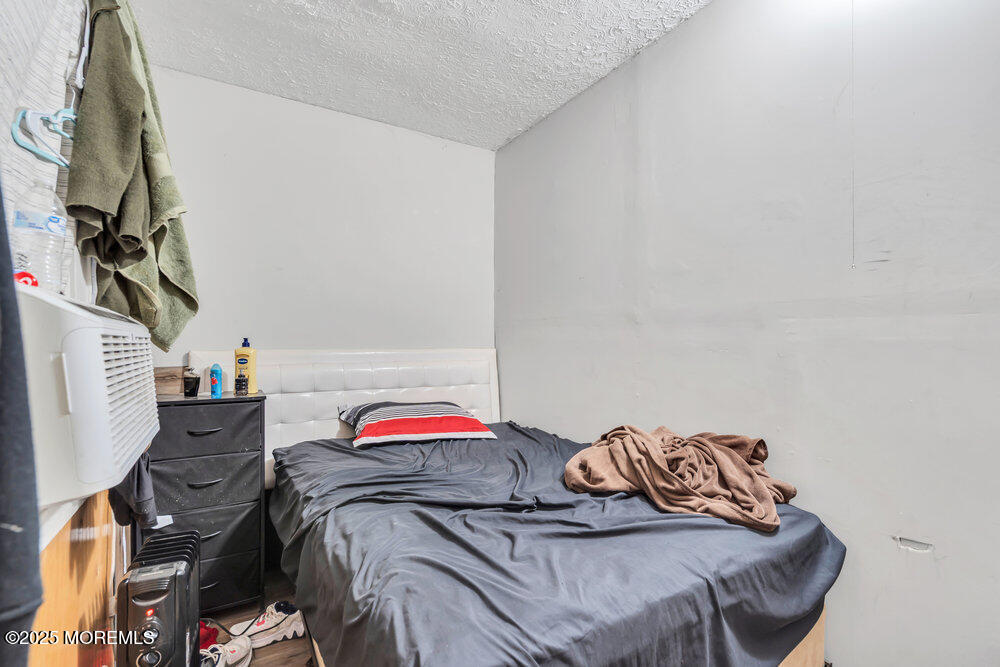 270 Alexander Avenue Howell, NJ 07731 - Photo 20 of 35 a bedroom with a bed and a closet