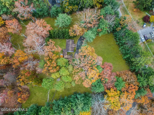 a view of a lake with a garden