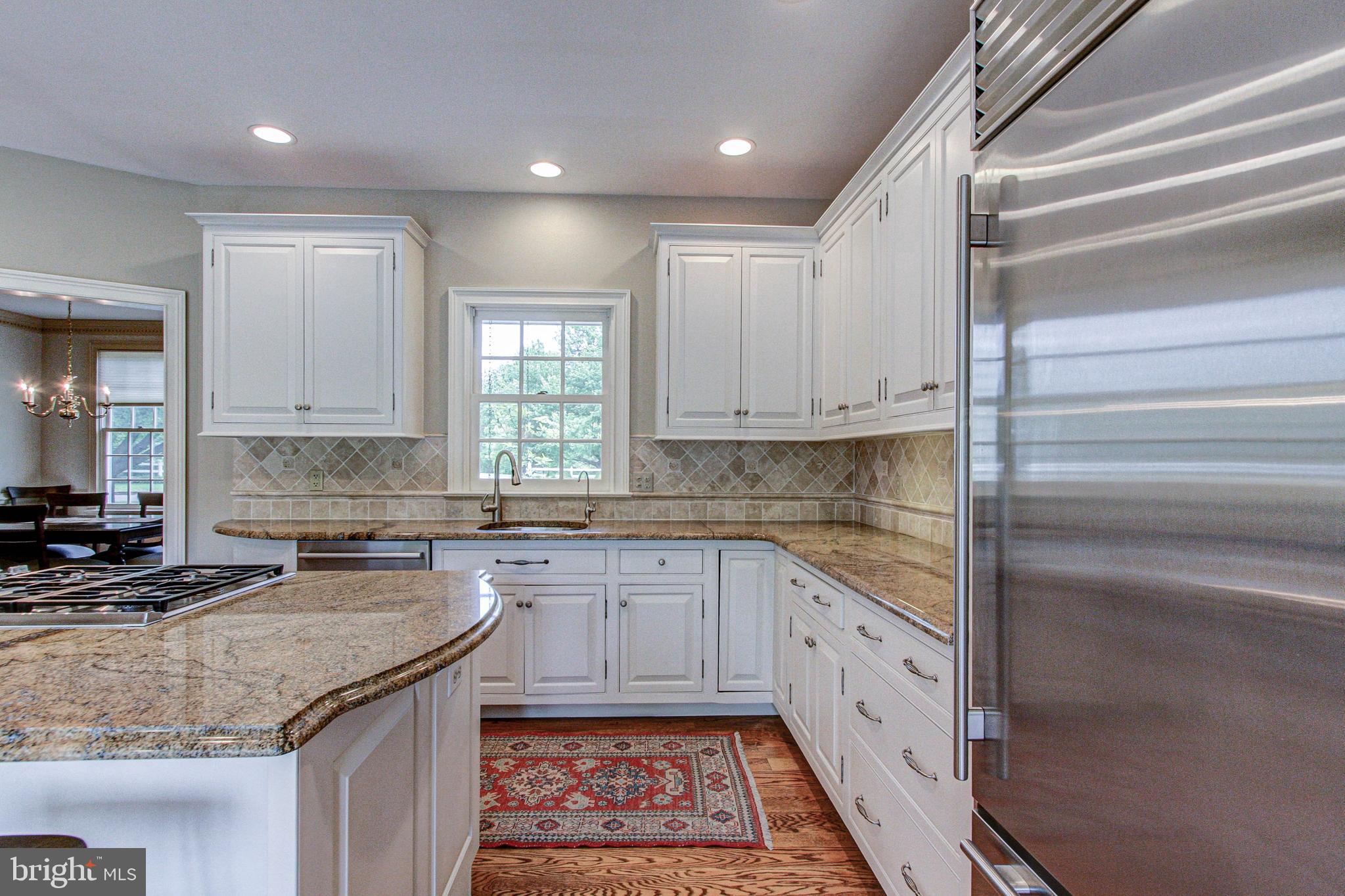 4040 Ruckman Way Doylestown, PA 18902 - Photo 11 of 48 Granite counters & Sub-zero refrigerator
