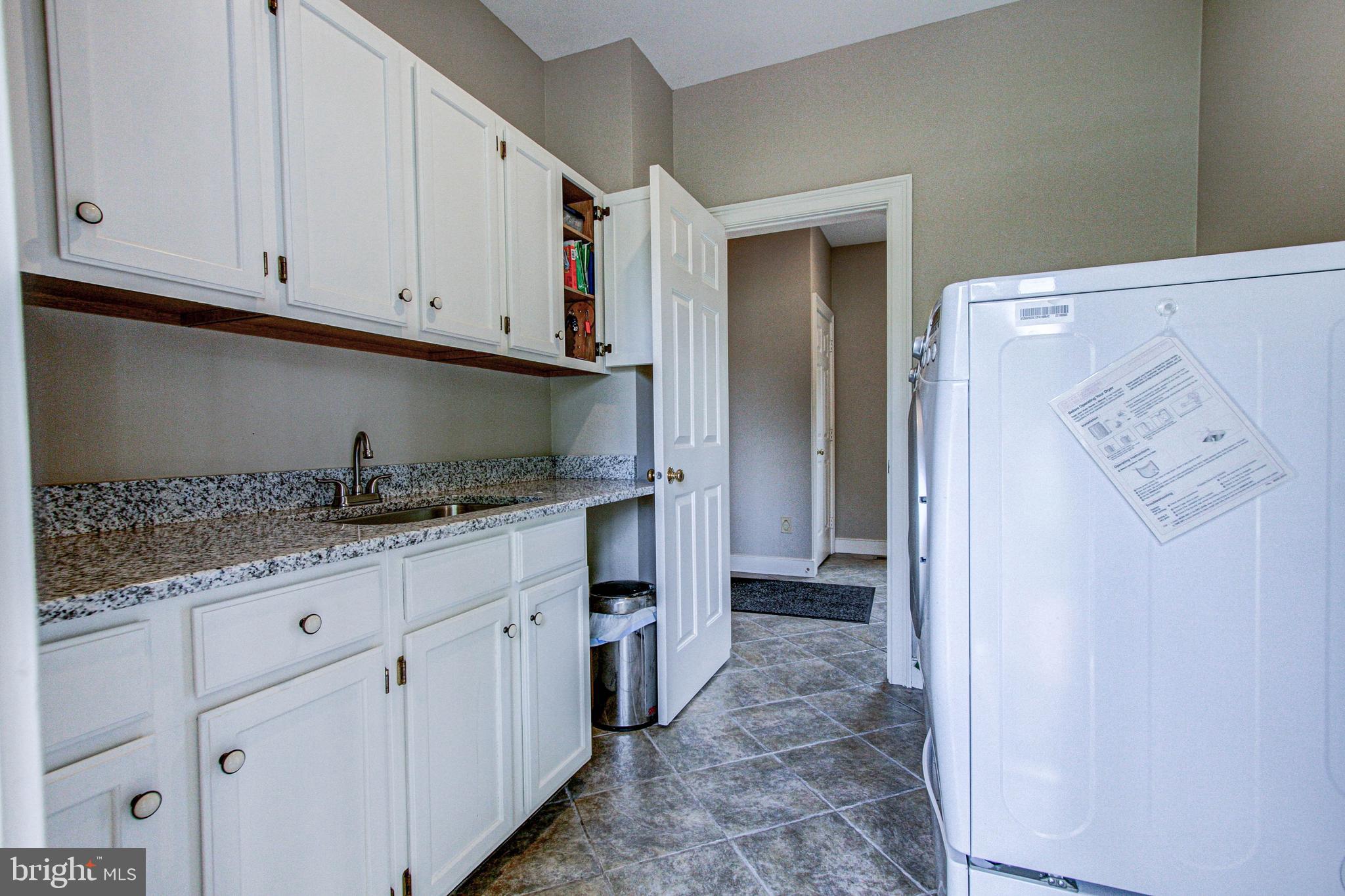 4040 Ruckman Way Doylestown, PA 18902 - Photo 38 of 48 Laundry just updated including granite counters
