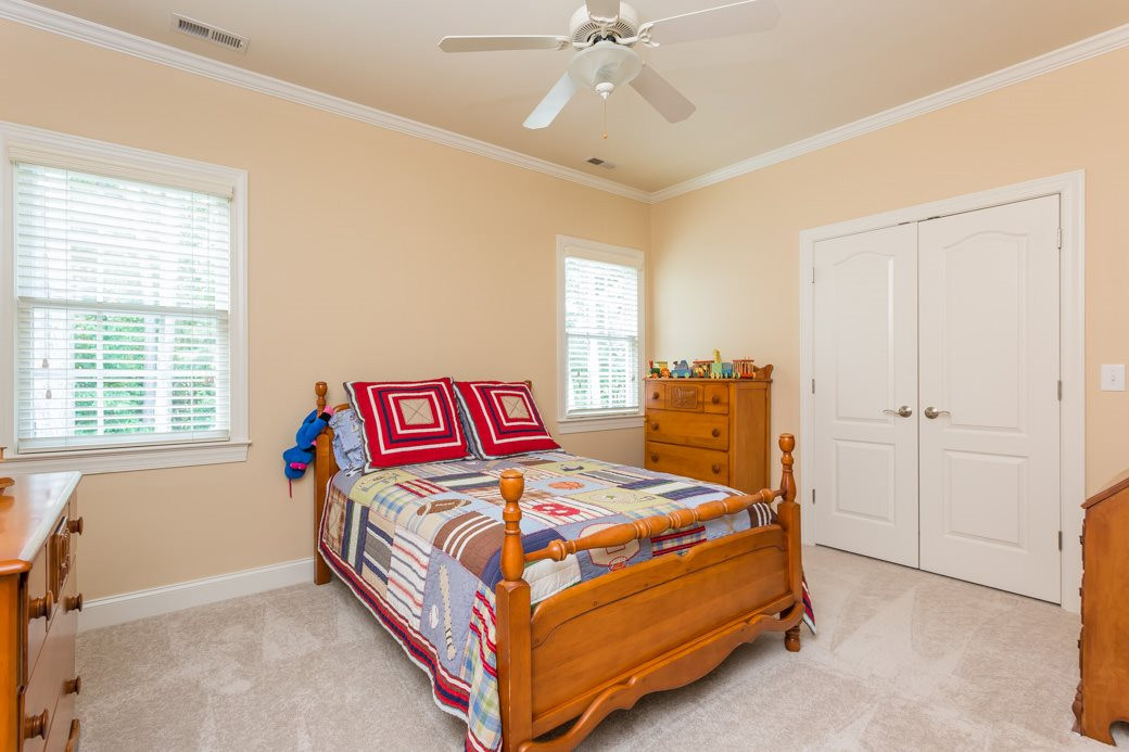 7220 Sunset Glen Point Raleigh, NC 27614 - Photo 18 of 25 This bedroom faces South and stays bright all day! Bedroom 4