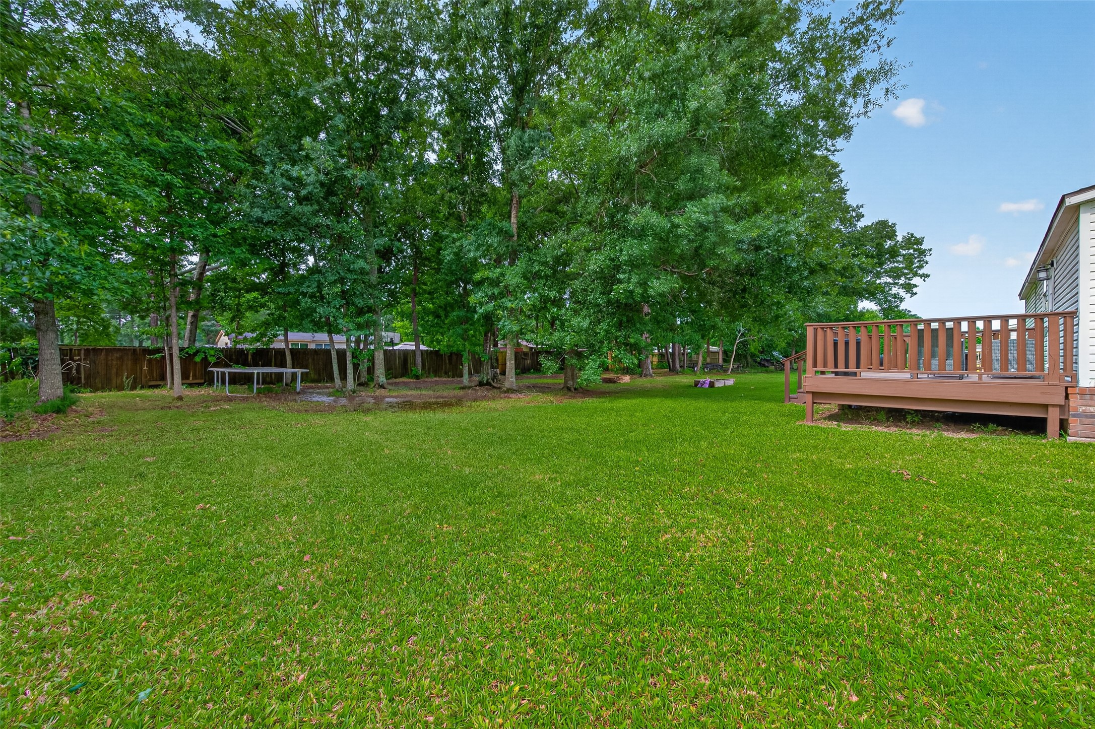 16572 River Ranch Drive Conroe, TX 77302 - Photo 15 of 18 a view of a chairs in a park
