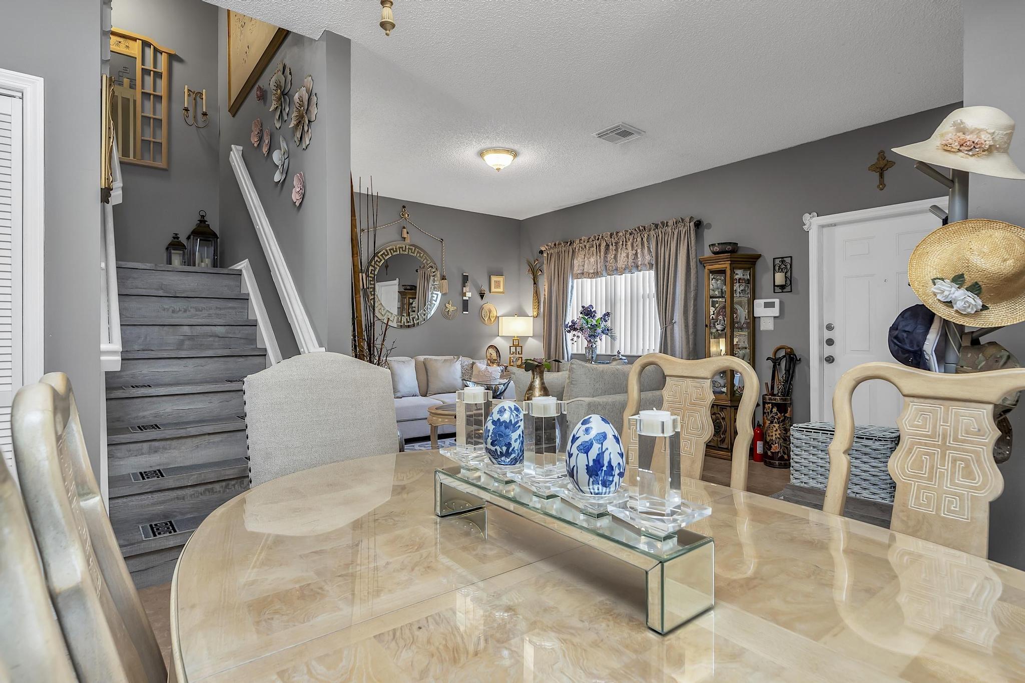 16637 Northwest 73rd Place Miami Lakes, FL 33014 - Photo 12 of 42 a living room with furniture and wooden floor