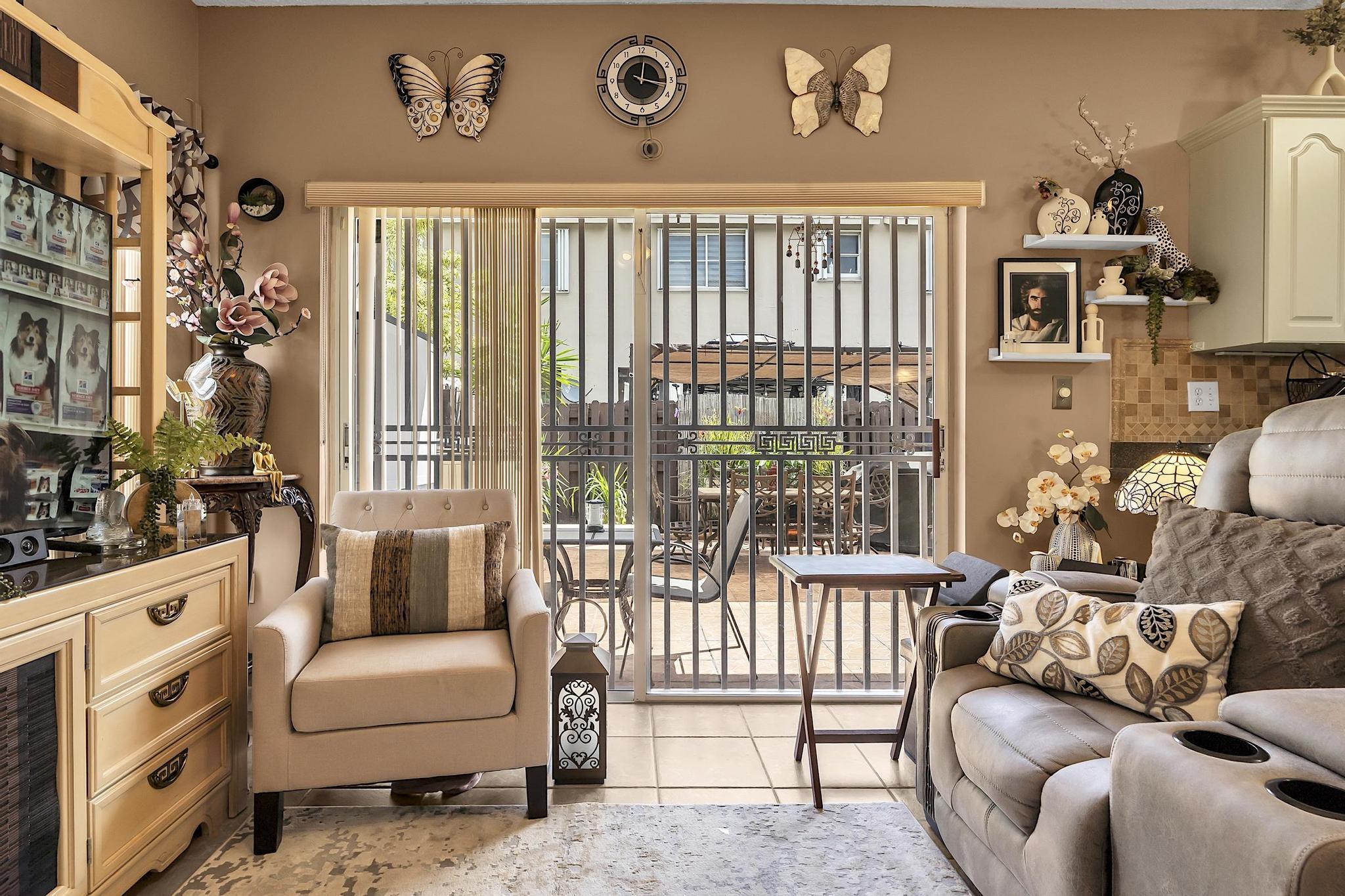 16637 Northwest 73rd Place Miami Lakes, FL 33014 - Photo 22 of 42 a living room with furniture and a large window
