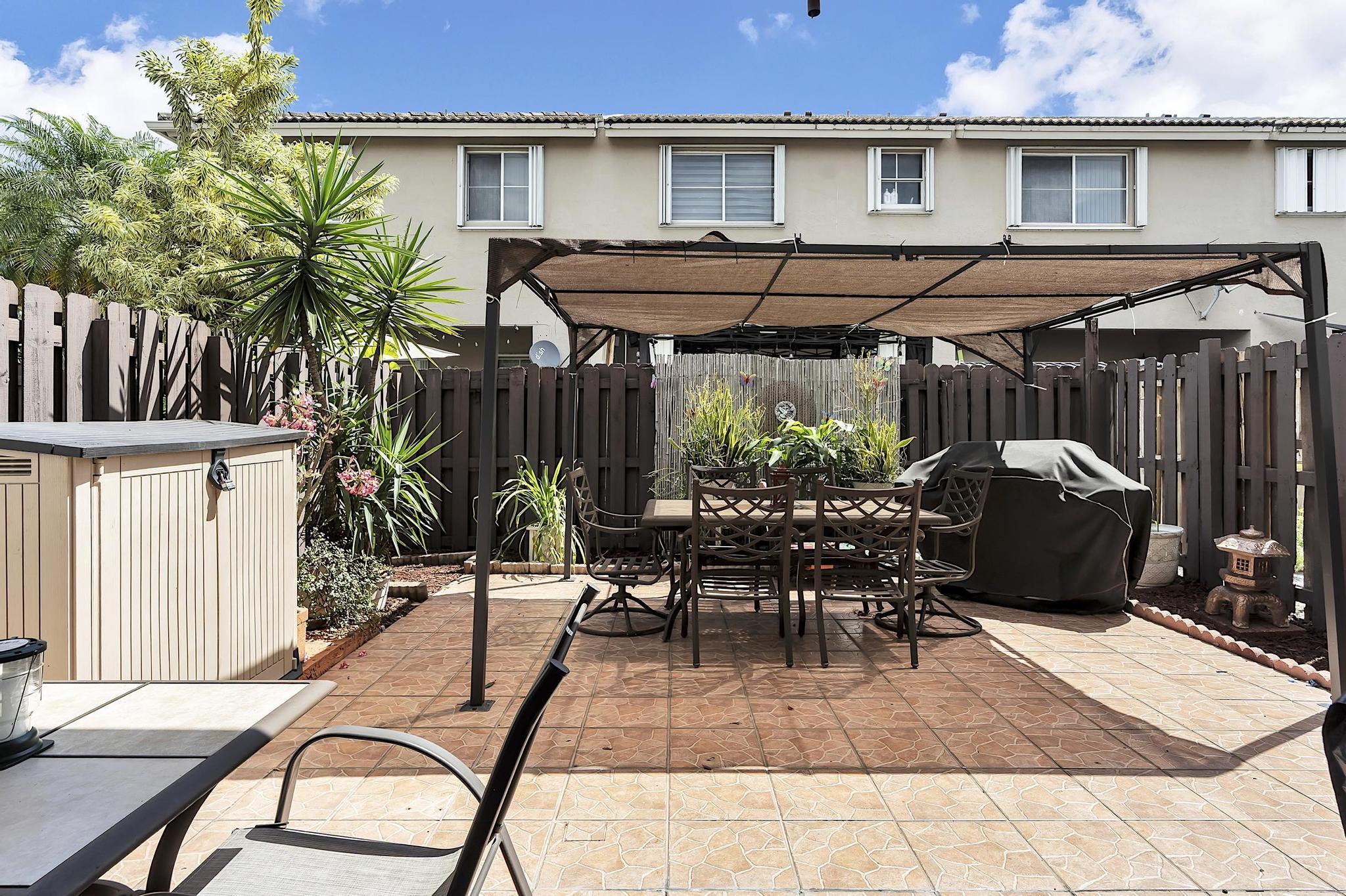 16637 Northwest 73rd Place Miami Lakes, FL 33014 - Photo 35 of 42 a view of outdoor space yard and patio