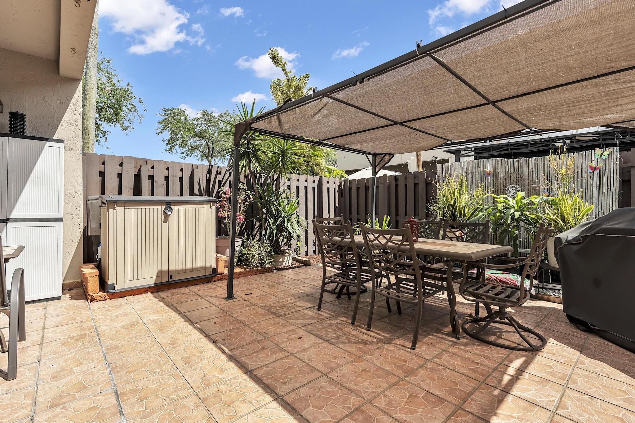 16637 Northwest 73rd Place Miami Lakes, FL 33014 - Photo 37 of 42 a view of outdoor space yard and patio