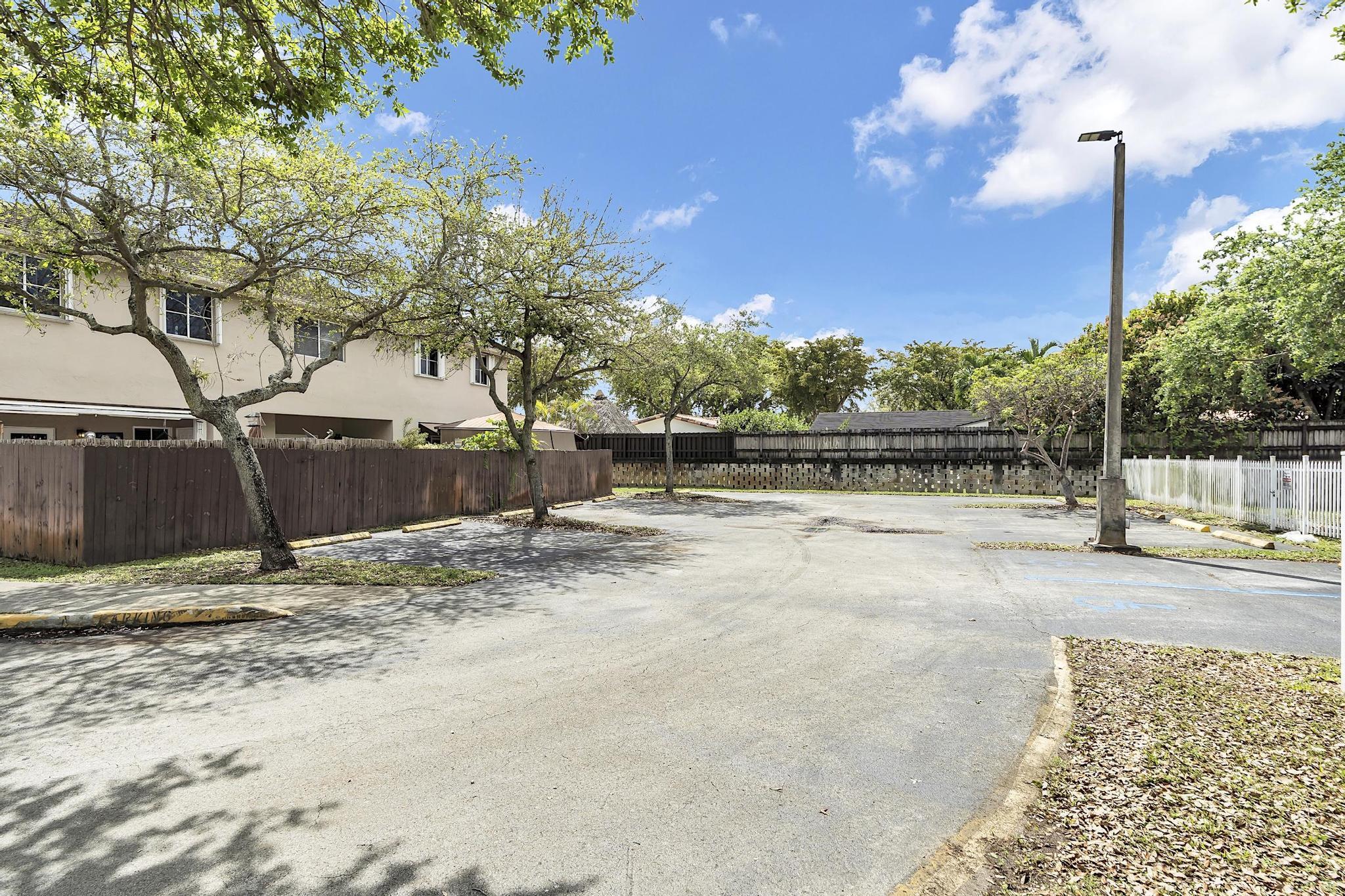 16637 Northwest 73rd Place Miami Lakes, FL 33014 - Photo 41 of 42 a view of a backyard of a house