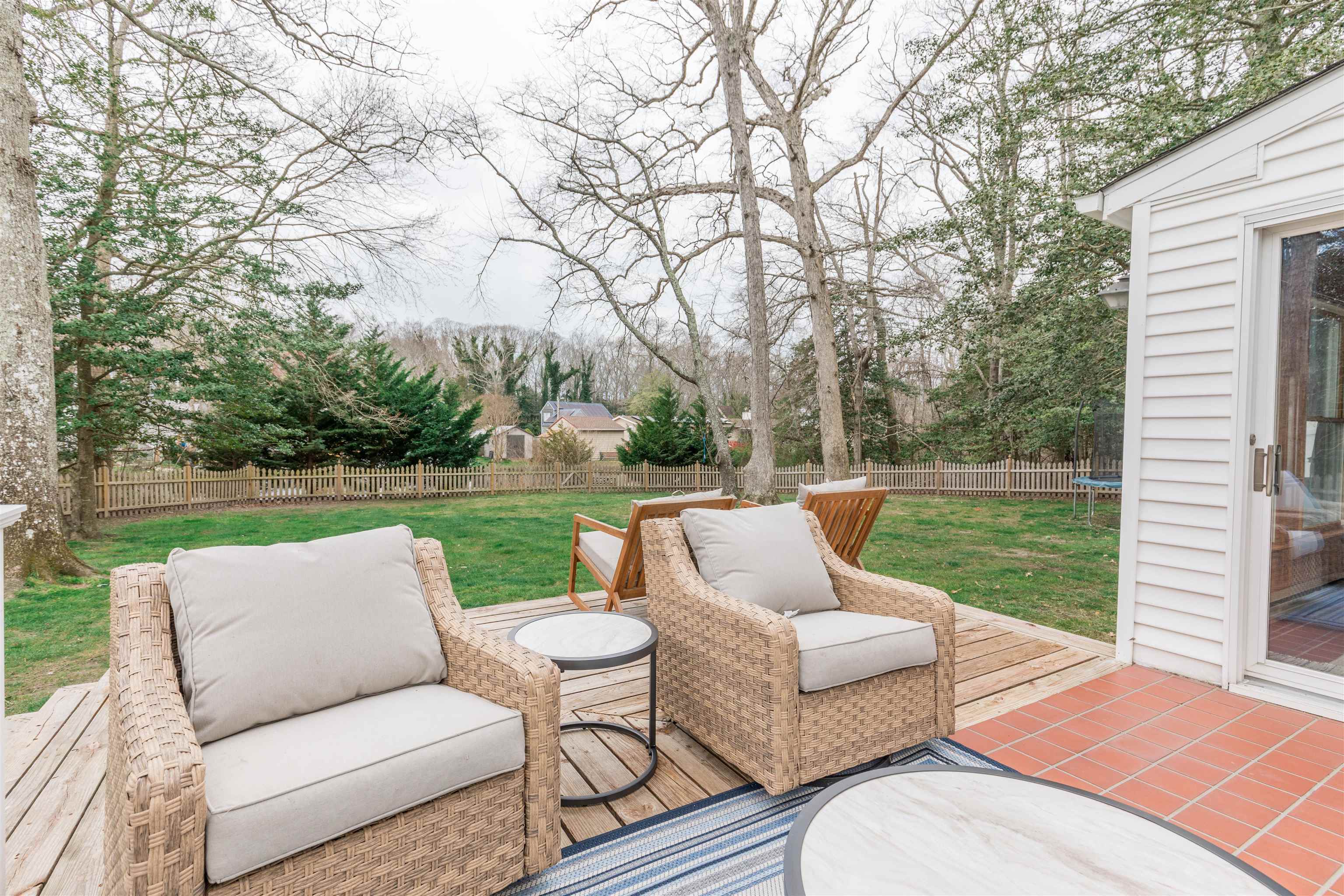 970 Tecumseh Road Erma, NJ 08204 - Photo 41 of 50 a view of a patio with couches chairs and a yard