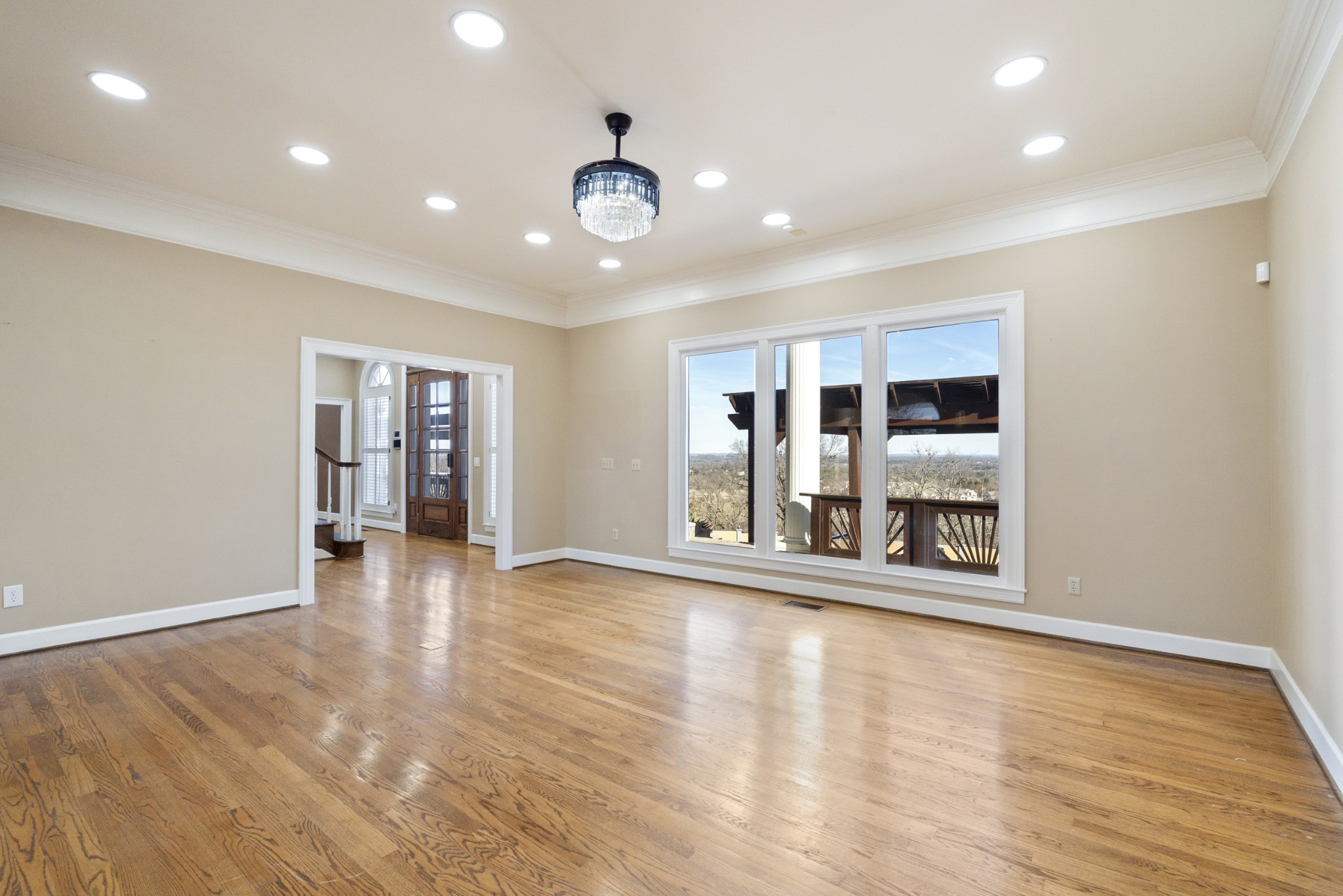 201 Vineyard Way Lebanon, TN 37087 - Photo 15 of 58 an empty room with wooden floor and large window