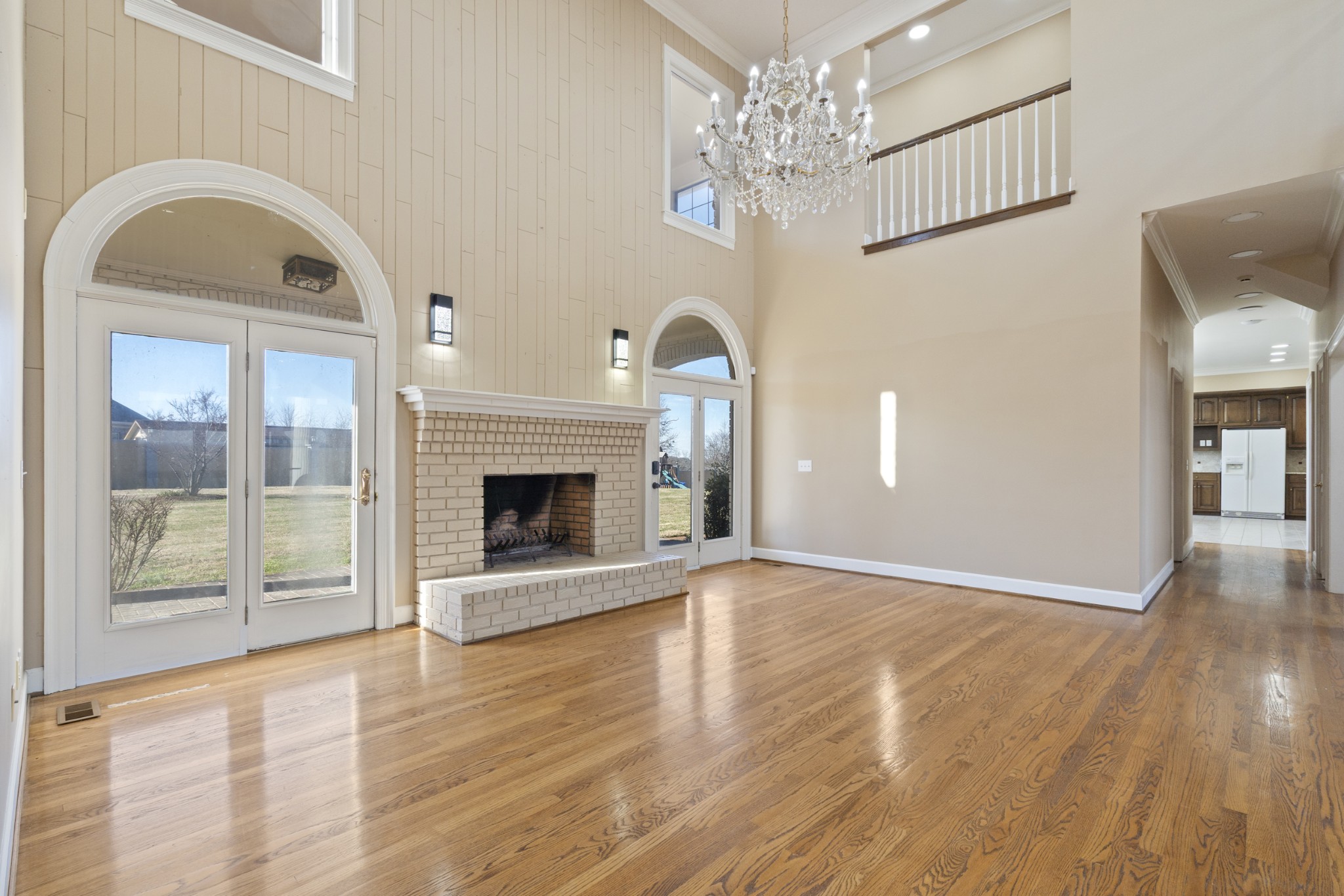 201 Vineyard Way Lebanon, TN 37087 - Photo 18 of 58 a view of a livingroom with a fireplace wooden floor and windows