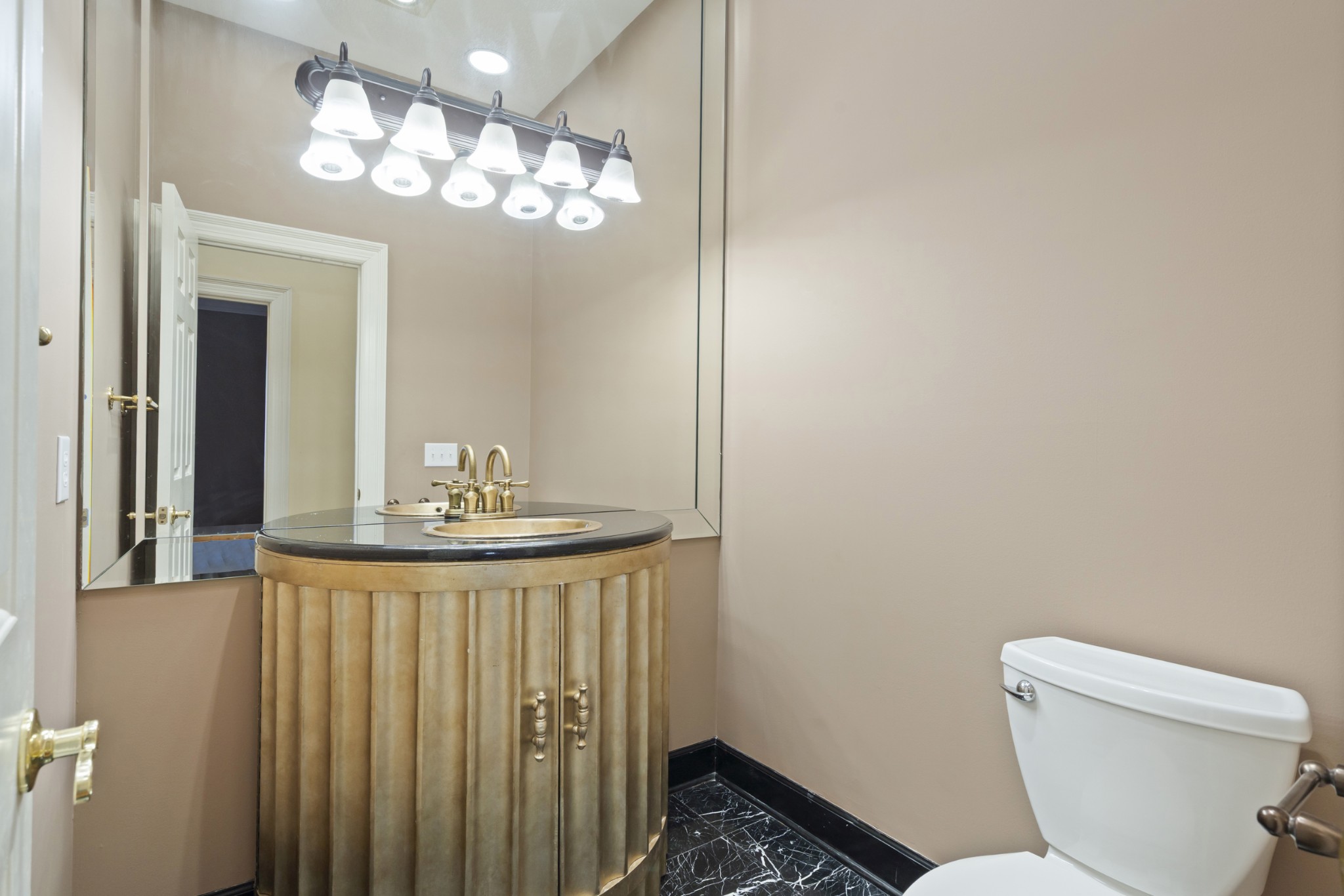 201 Vineyard Way Lebanon, TN 37087 - Photo 30 of 58 a bathroom with a toilet a sink and mirror