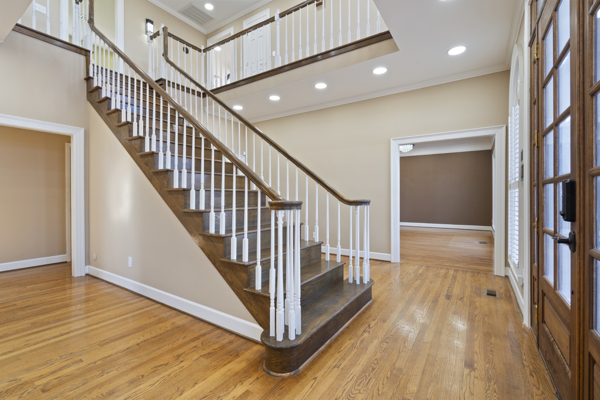 201 Vineyard Way Lebanon, TN 37087 - Photo 31 of 58 a view of a hallway with wooden floor and staircase