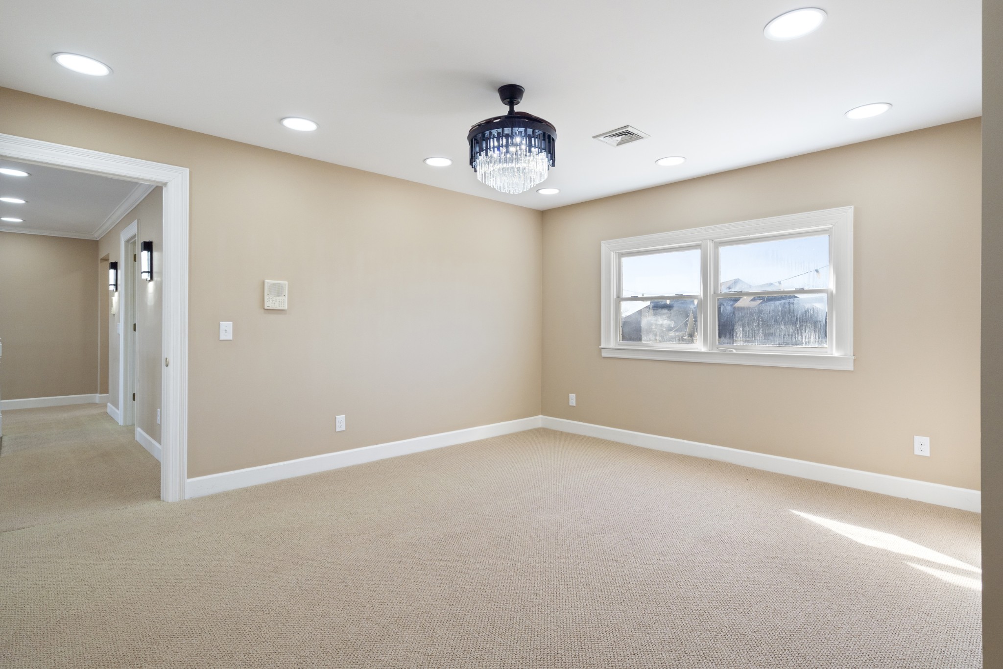 201 Vineyard Way Lebanon, TN 37087 - Photo 34 of 58 an empty room with windows and ceiling fan