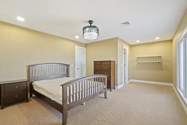 a bathroom with a sink a vanity and a mirror