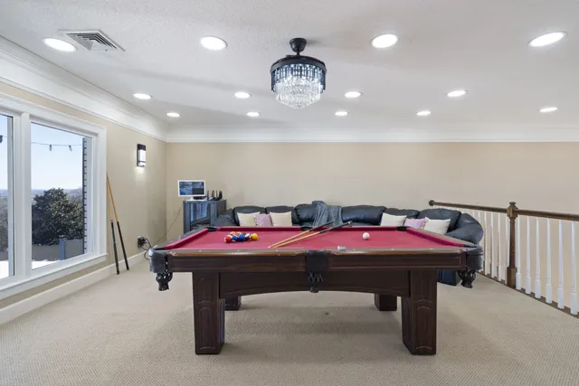 a view of a hallway with a room