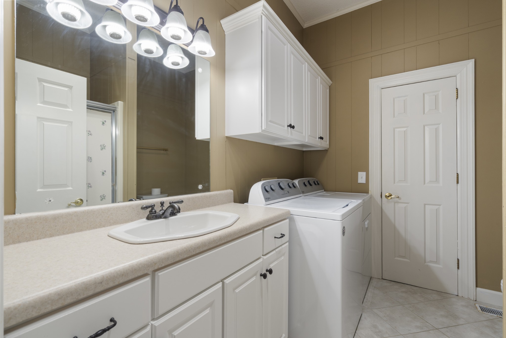 201 Vineyard Way Lebanon, TN 37087 - Photo 41 of 58 a bathroom with a sink a vanity and a mirror