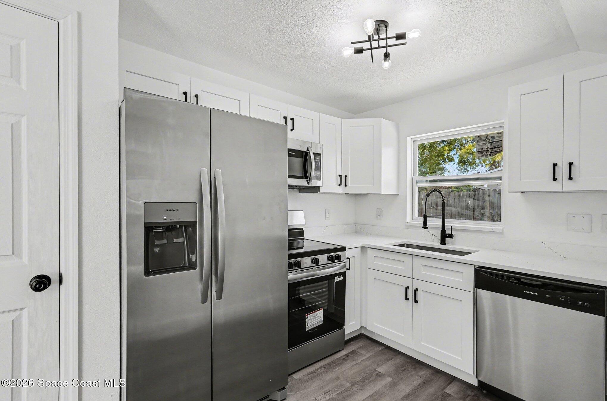 5240 Sutton Avenue Melbourne, FL 32904 - Photo 15 of 31 009__amp5474_660