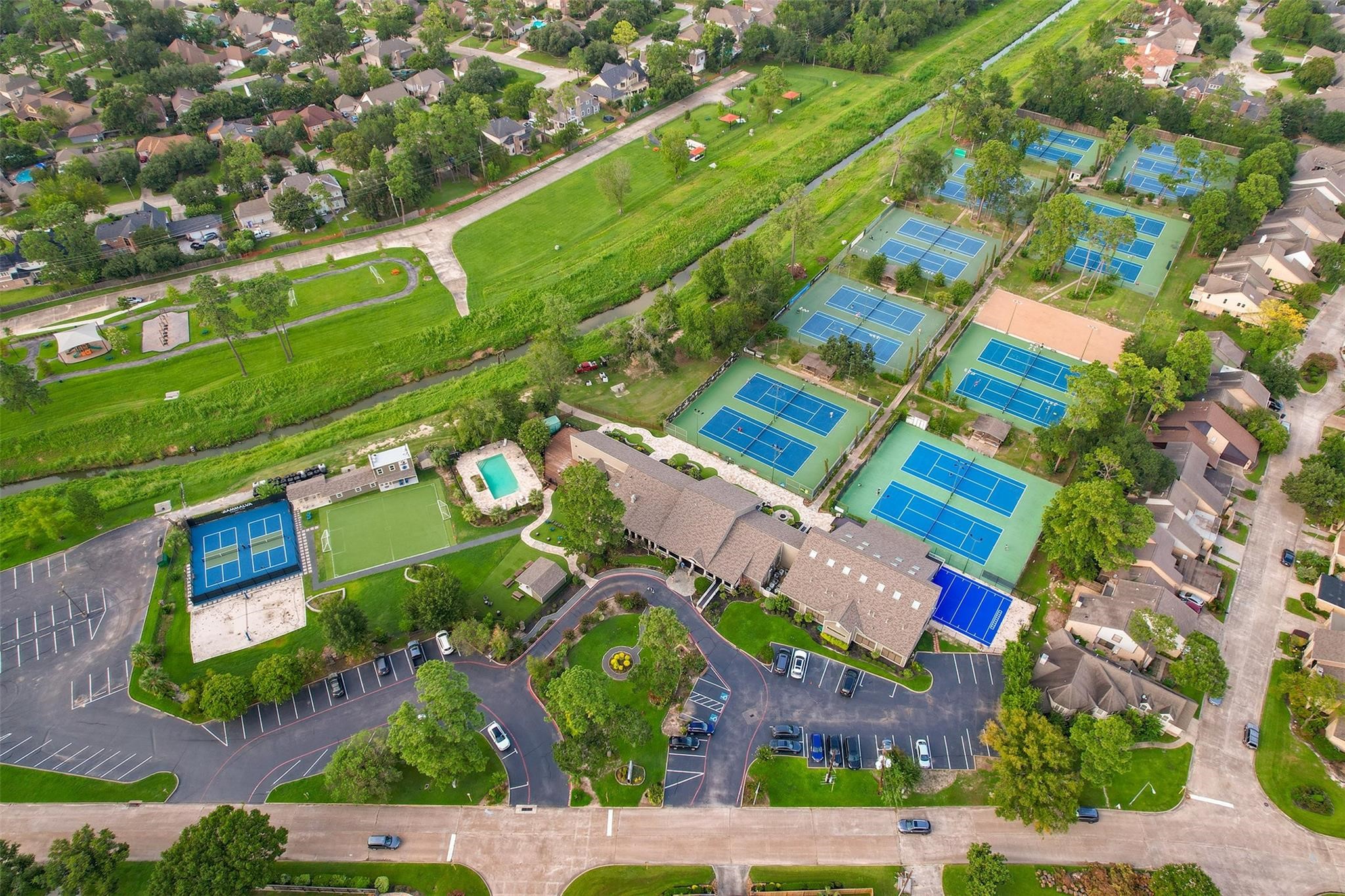16123 Lafone Drive Spring, TX 77379 - Photo 44 of 47 From pickleball and numerous tennis courts to the clubhouse and additional recreational amenities, Wimbledon Forest offers abundant opportunities for recreation, connection, and an active lifestyle.