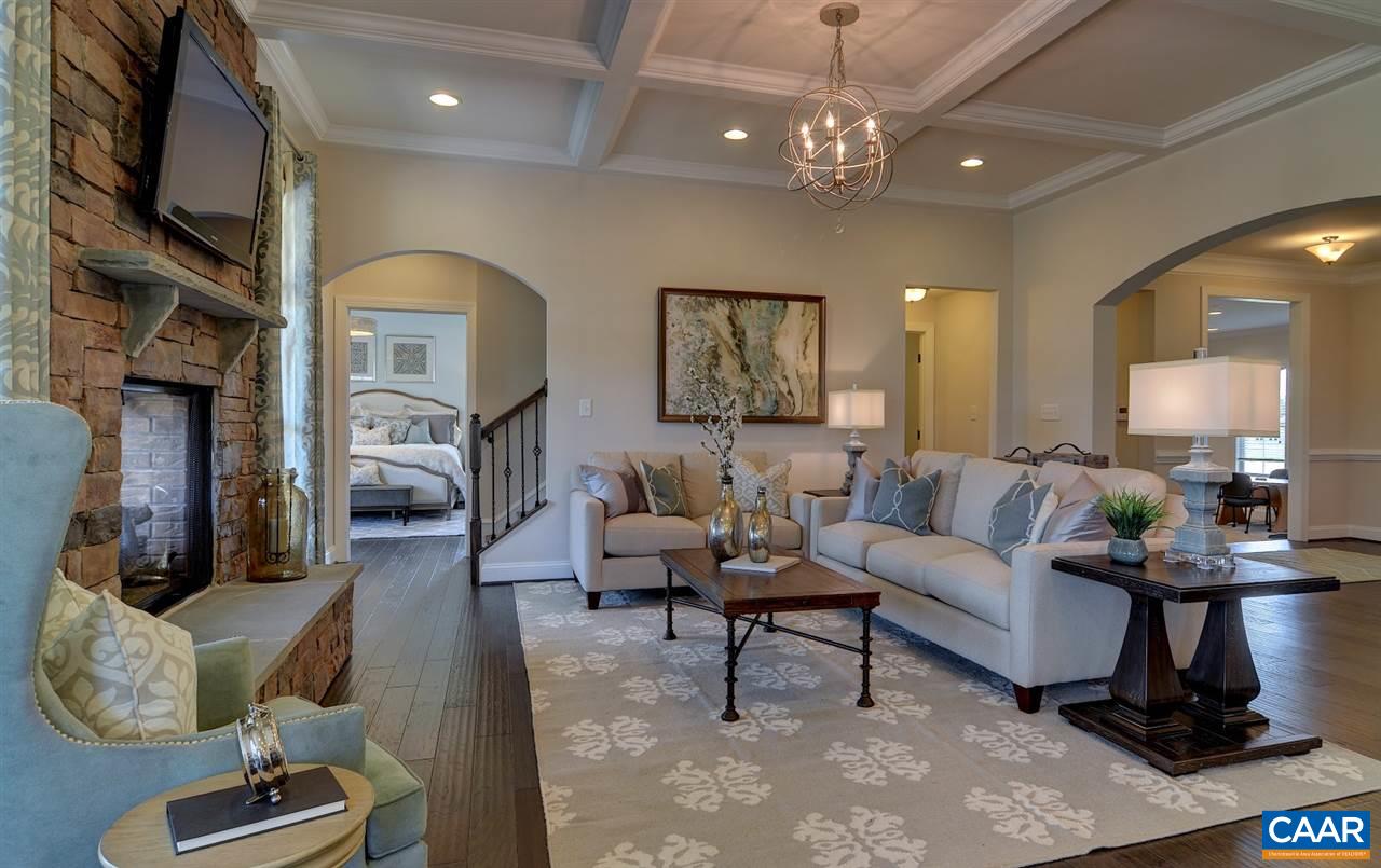 83 Ridgemont Road Ruckersville, VA 22968 - Photo 4 of 12 a living room with furniture and a chandelier