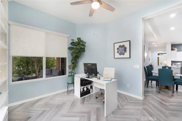 a workspace with furniture window and outside view