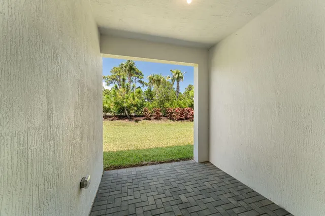 a view of a garden from a hallway
