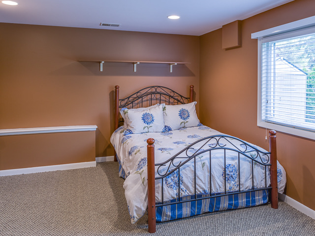 21W230 Coronet Road Lombard, IL 60148 - Photo 17 of 24 a bedroom with a bed and a window