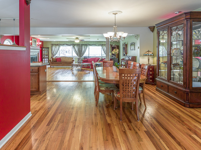 21W230 Coronet Road Lombard, IL 60148 - Photo 5 of 24 a view of a dining room with furniture window and wooden floor
