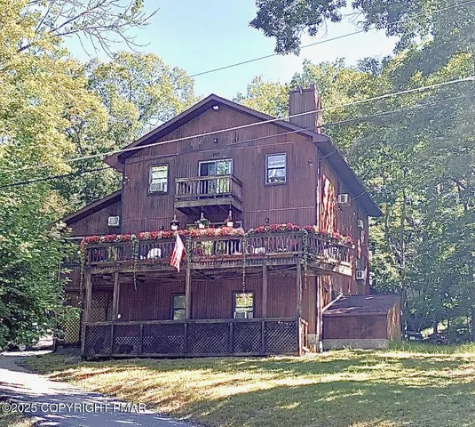 a view of a lake with a yard