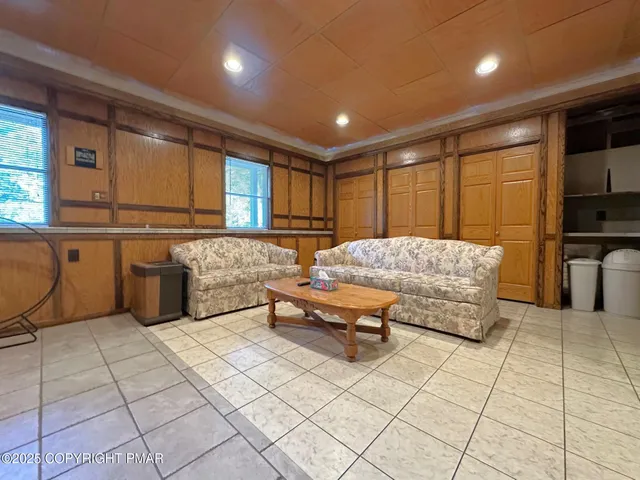 a en suite bathroom with a sink and a large mirror