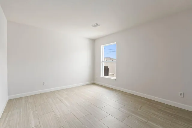 an empty room with a window