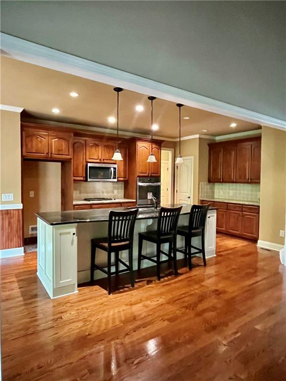 348 Hidden Trail Pendergrass, GA 30567 - Photo 15 of 40 a view of a a dining room with furniture window and wooden floor