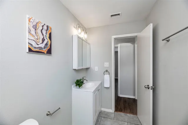 a view of a large body of water with a large tree