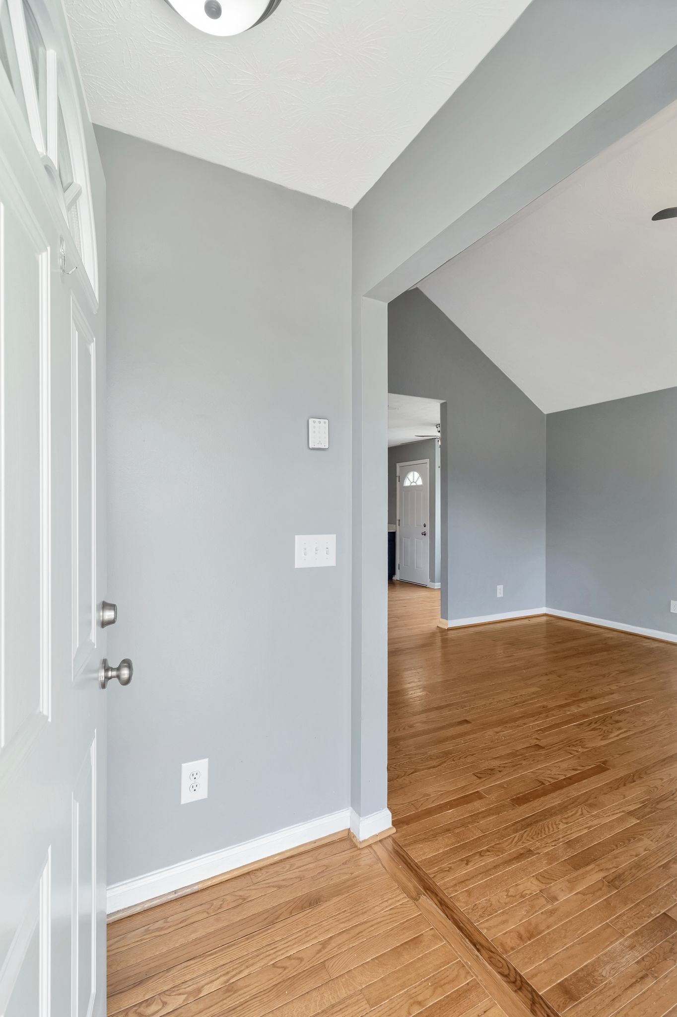 7543 Chadwick Drive Murfreesboro, TN 37129 - Photo 3 of 16 a view of an empty room with wooden floor and closet