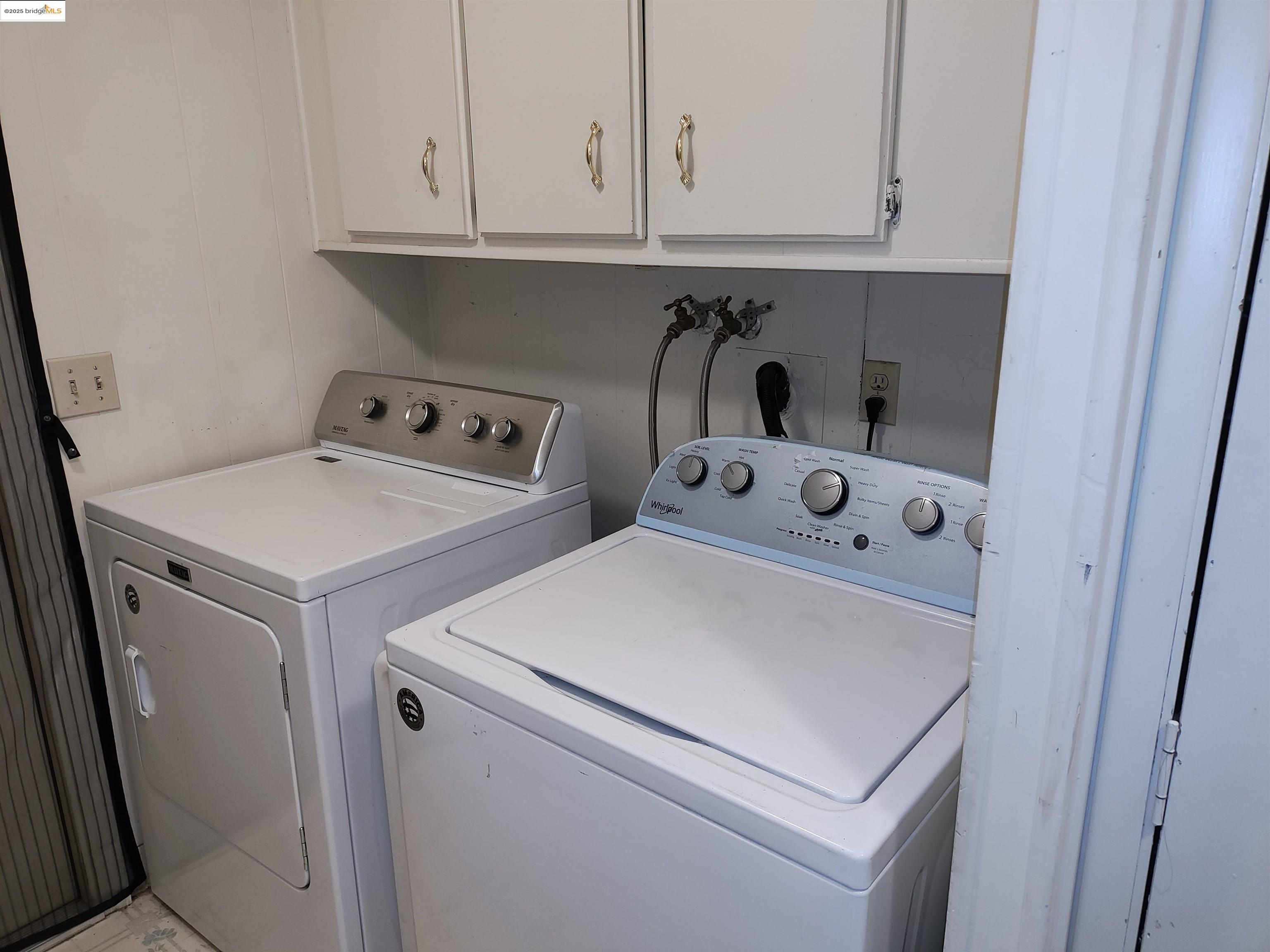 10956 Green Street, Unit 152 Columbia, CA 95310 - Photo 8 of 46 a utility room with dryer and washer