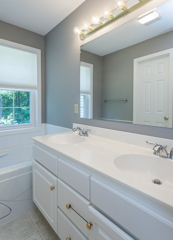 30 Two Ponds Road Belchertown, MA 01007 - Photo 14 of 26 a bathroom with a sink and a bathtub