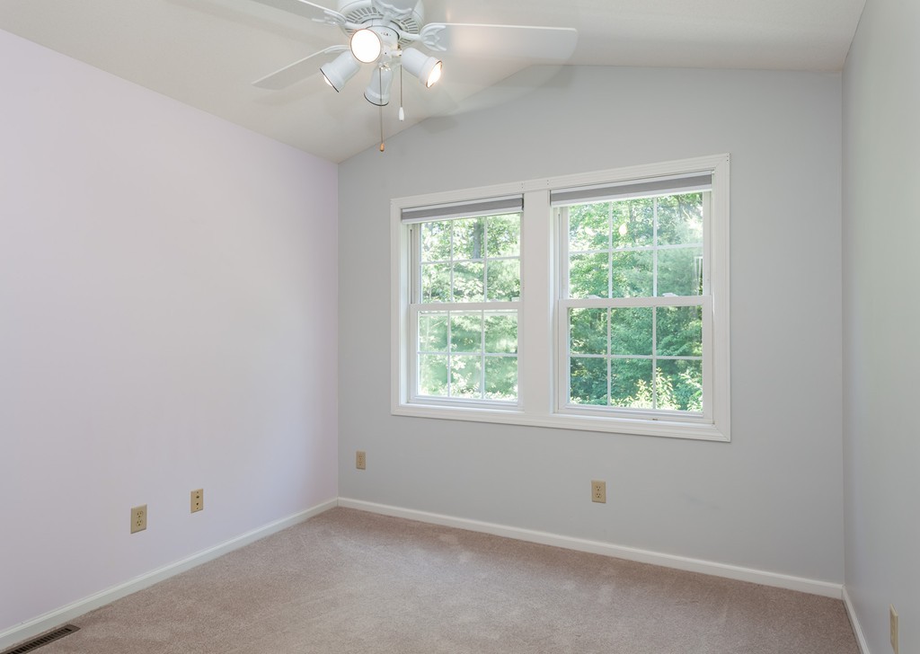 30 Two Ponds Road Belchertown, MA 01007 - Photo 15 of 26 an empty room with a window and a fan