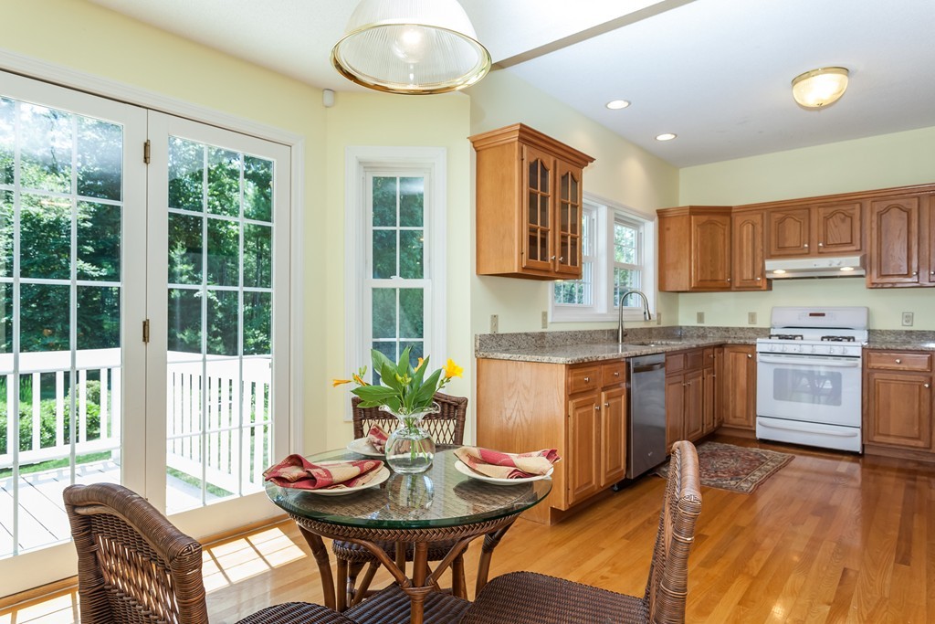 30 Two Ponds Road Belchertown, MA 01007 - Photo 3 of 26 a kitchen with a table and chairs in it