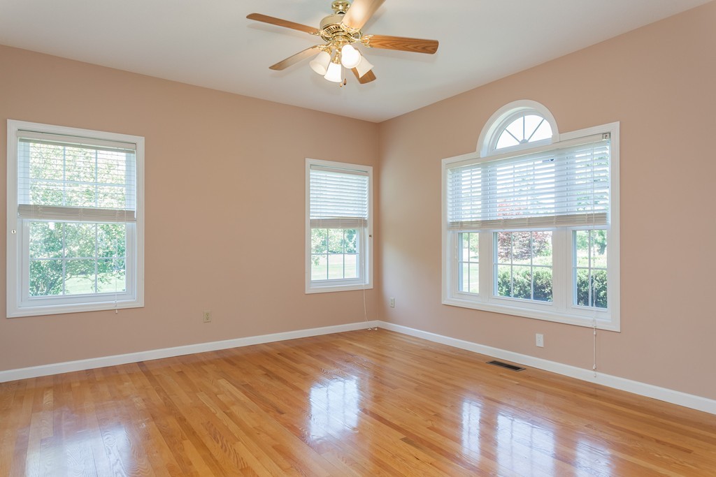 30 Two Ponds Road Belchertown, MA 01007 - Photo 9 of 26 a view of an empty room with wooden floor and a window