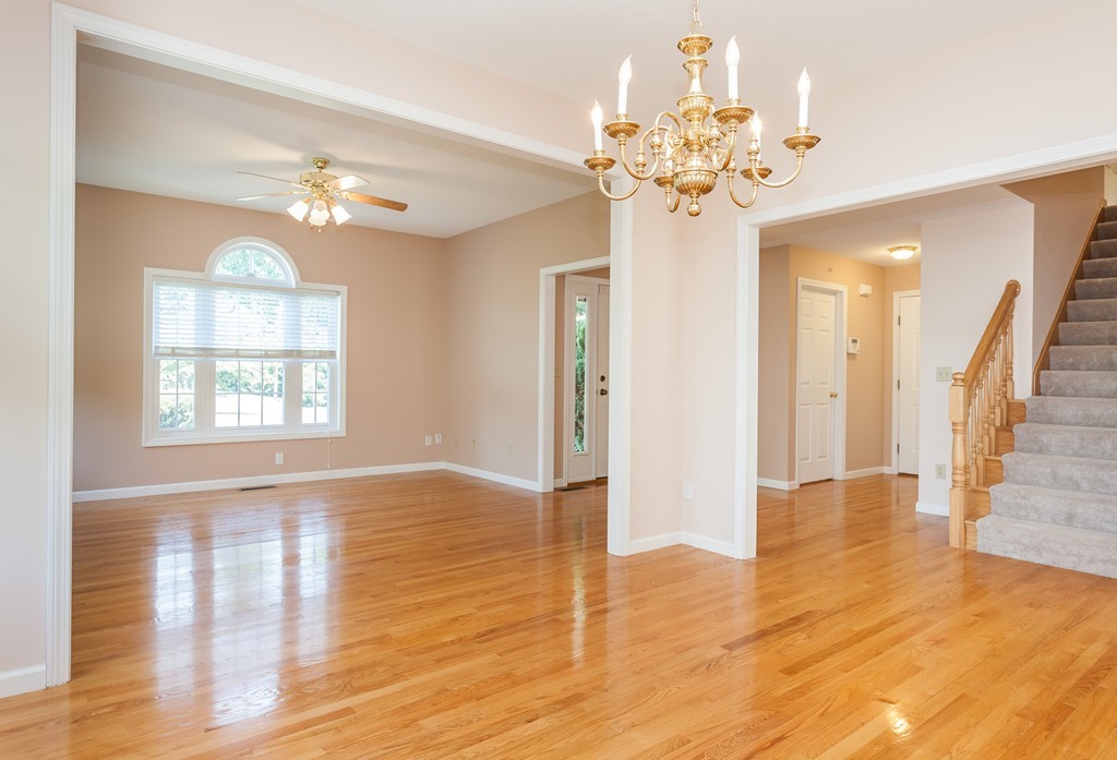 30 Two Ponds Road Belchertown, MA 01007 - Photo 10 of 26 a view of an entryway with wooden floor and a chandelier
