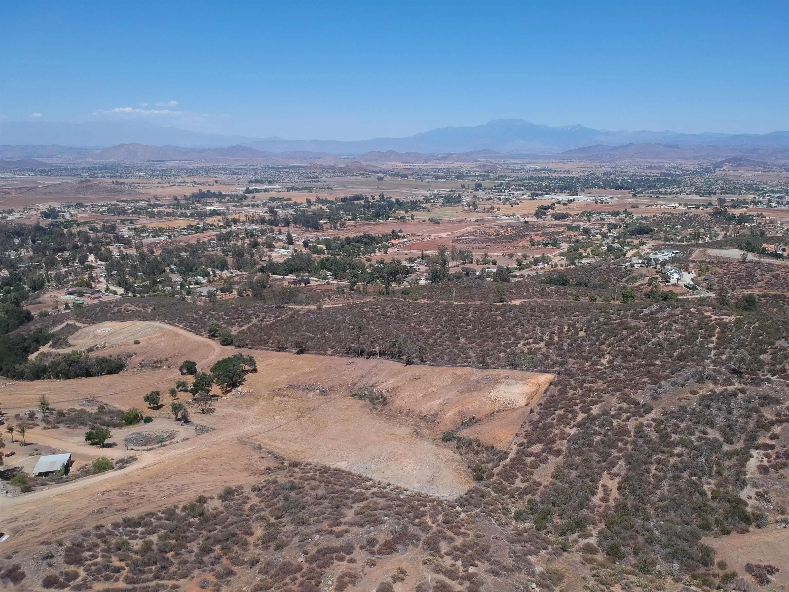 0 Elroy Road Menifee, CA 92584 - Photo 26 of 49 an aerial view of a houses with a yard